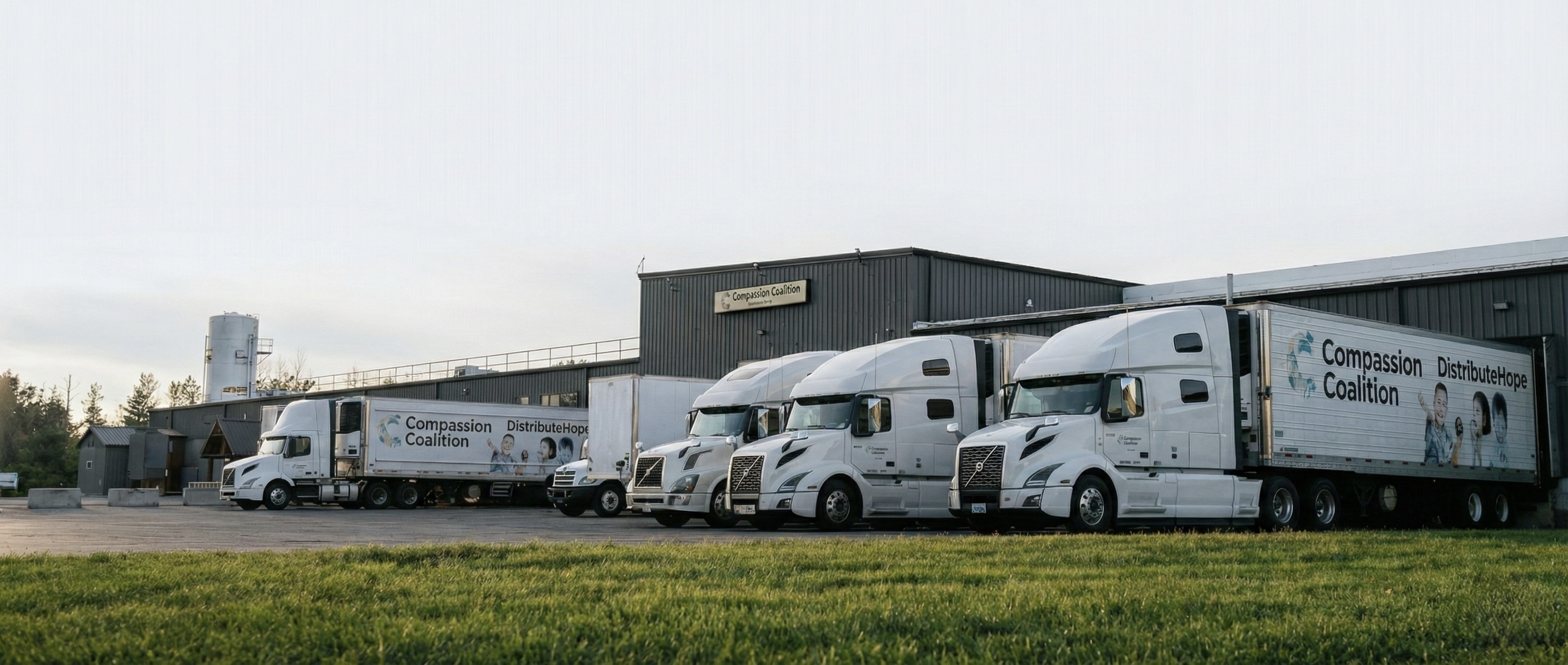 Compassion Coalition trucks and warehouse